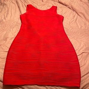 Form-fitting red dress